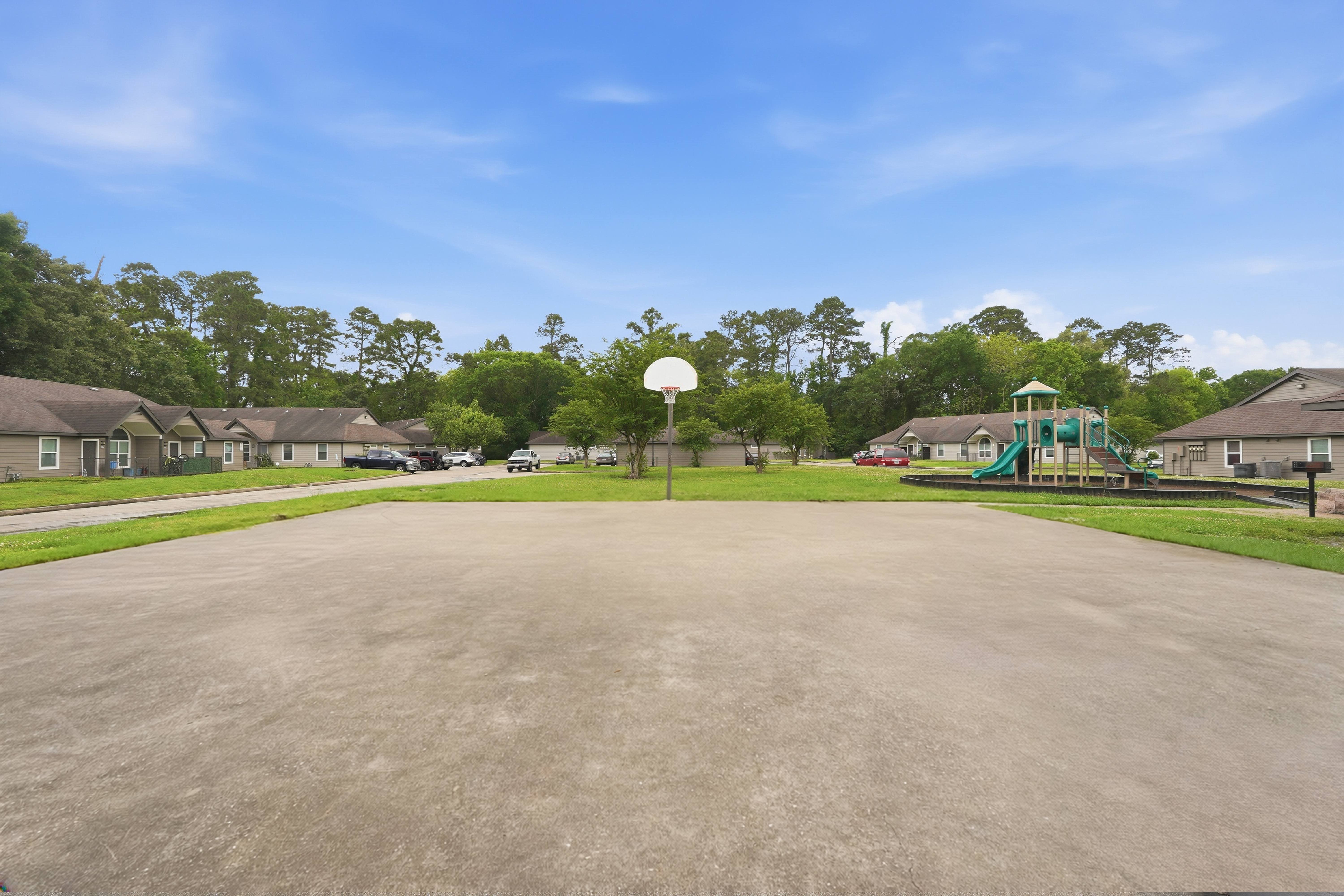 Basketball courts at Dayton Park Apartments in Dayton TX